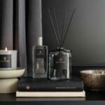 100ml-fragranced-diffuser-ash-collection-product-image-with-grey-liquid-and-black-reeds